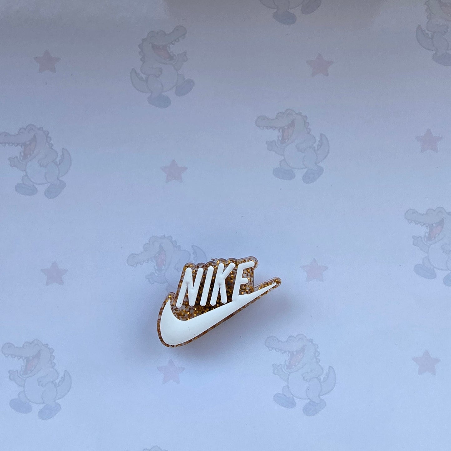 gold tick croc charm